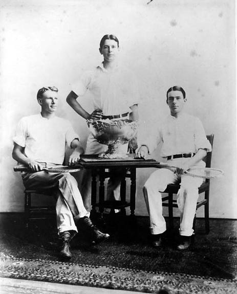 Dwight Davis (center) in 1900 with the original Davis Cup trophy.