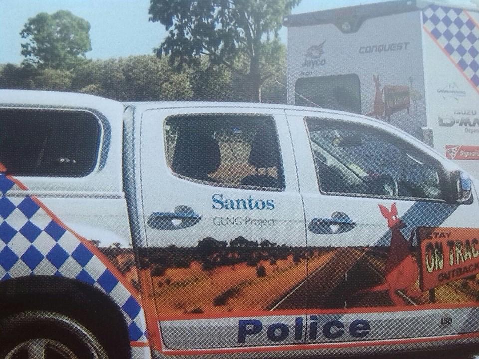 Gas company Santos logo on a police vehicle. Photo found on Queensland Police website.